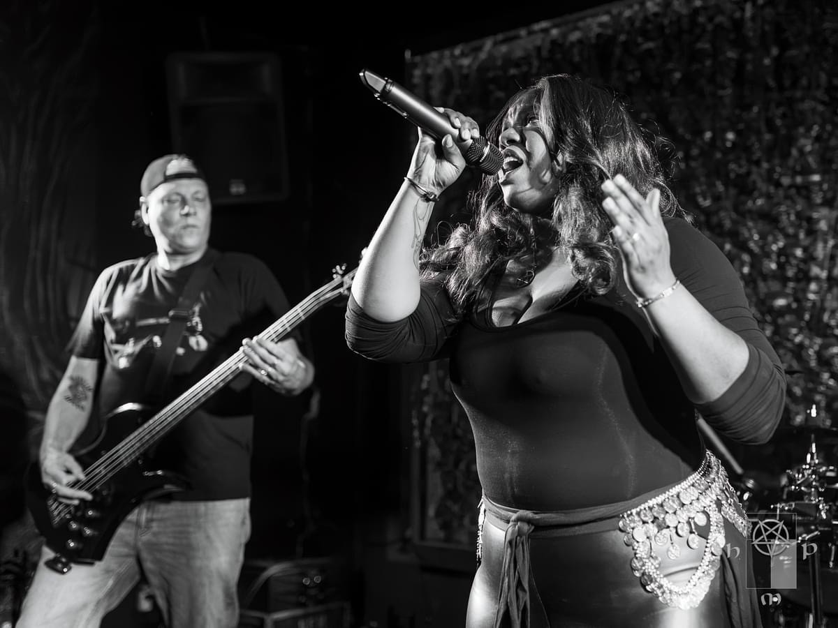 Iperion vocalist performing live