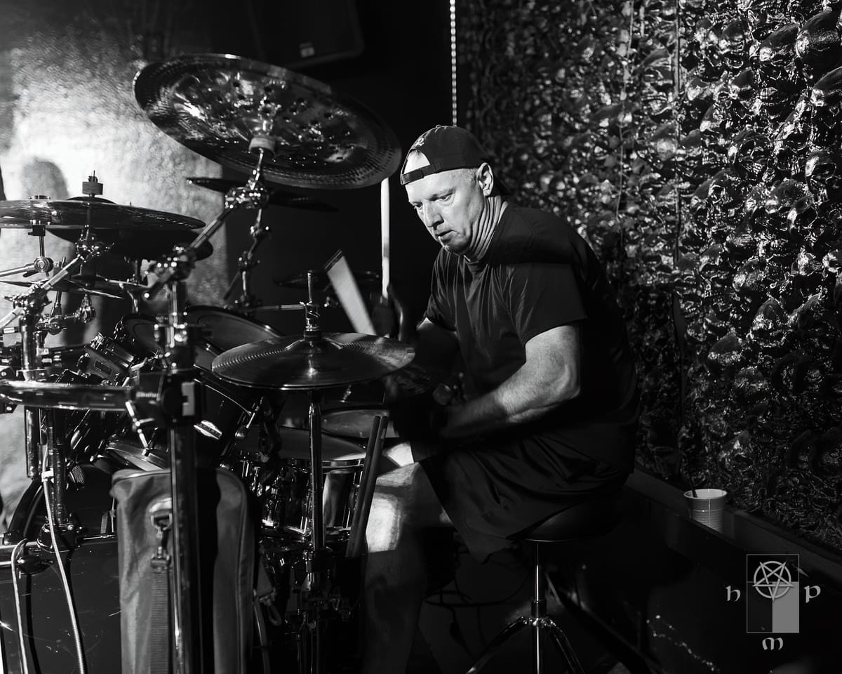Iperion drummer performing live