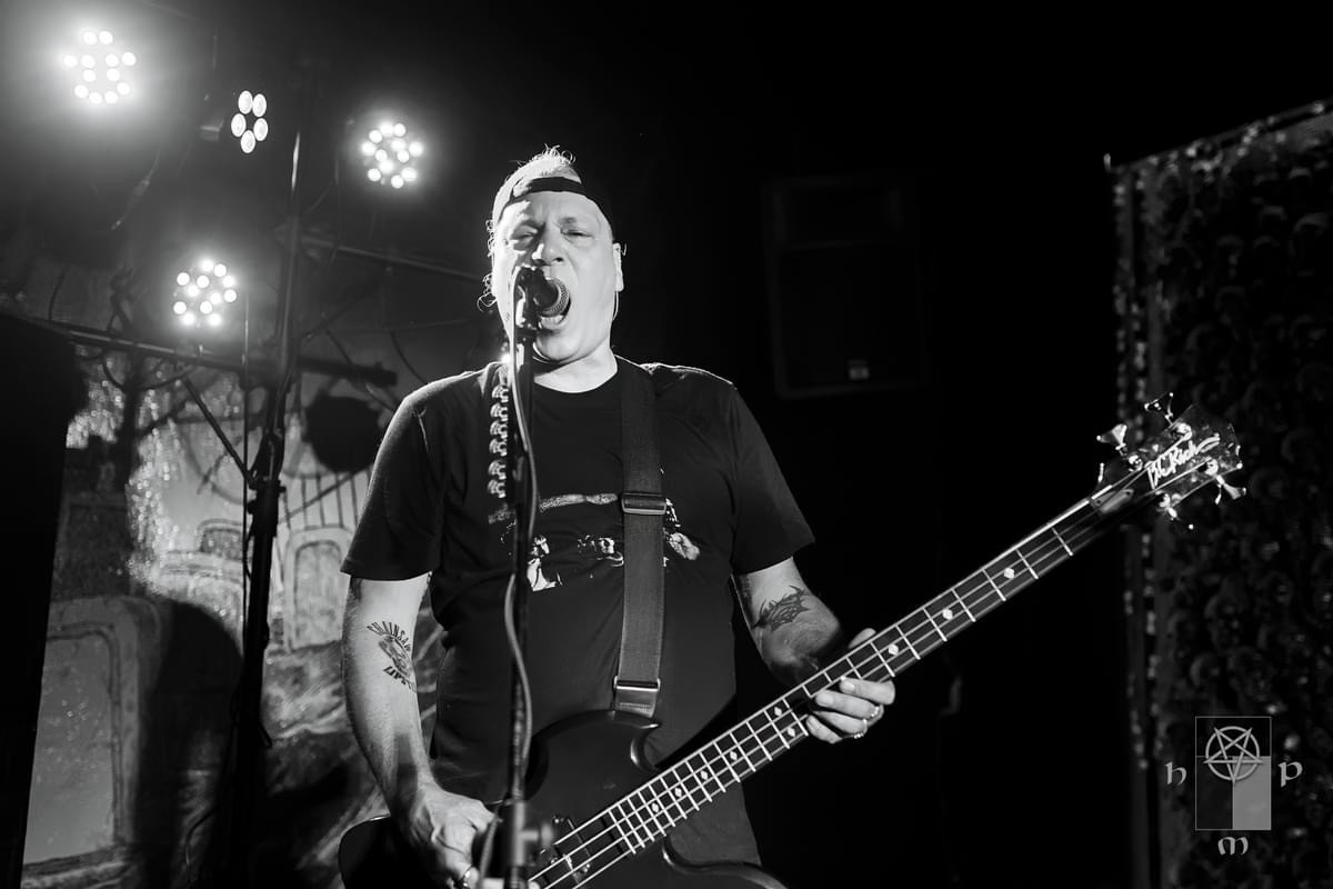 Iperion bassist performing